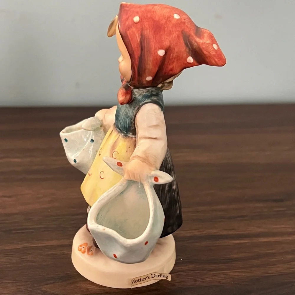 Charming Ceramic Figurine, mother darling with Red and Blue Accents